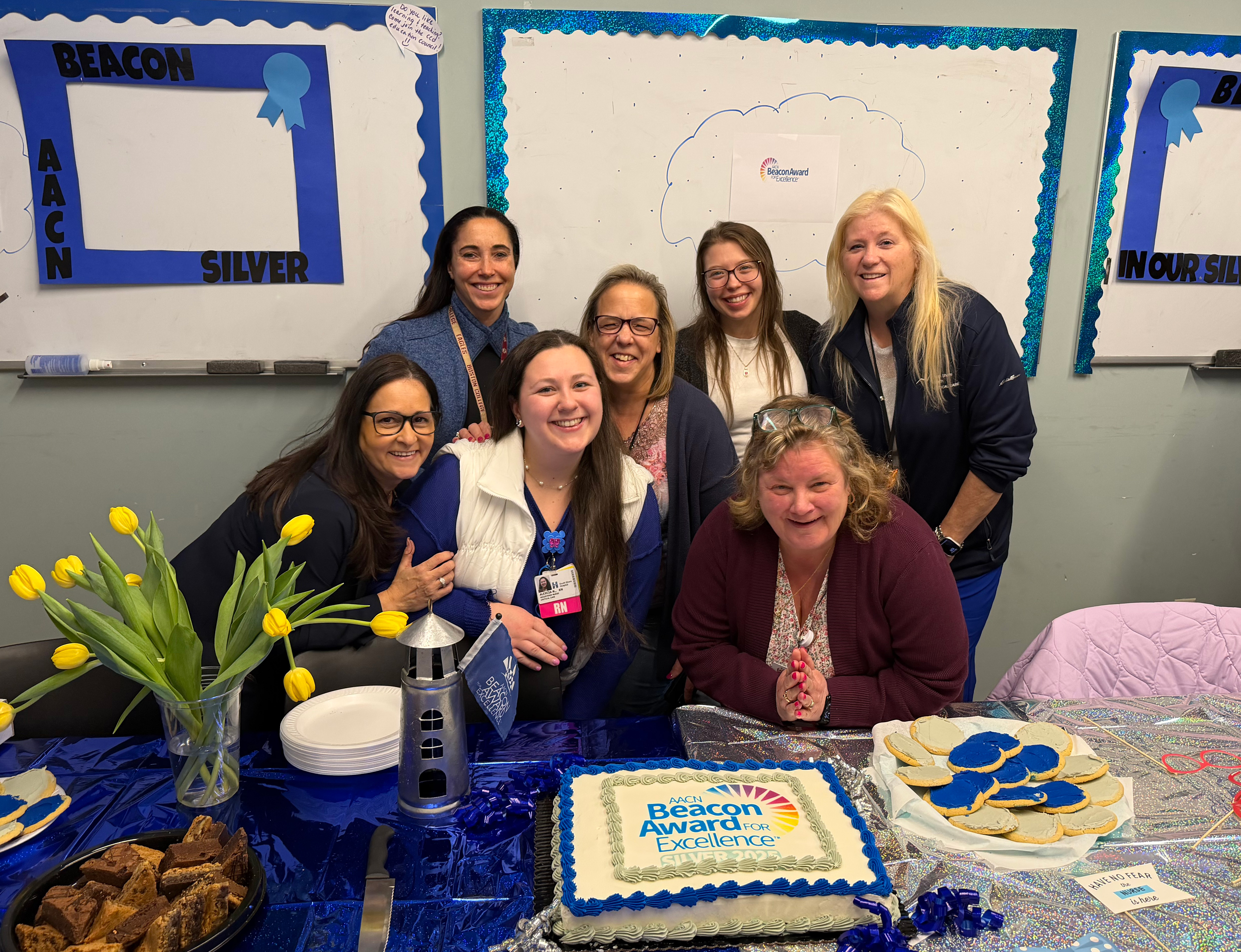 Colleagues from South Shore Health's CCU gathered in celebration of their recent Beacon Silver recognition.