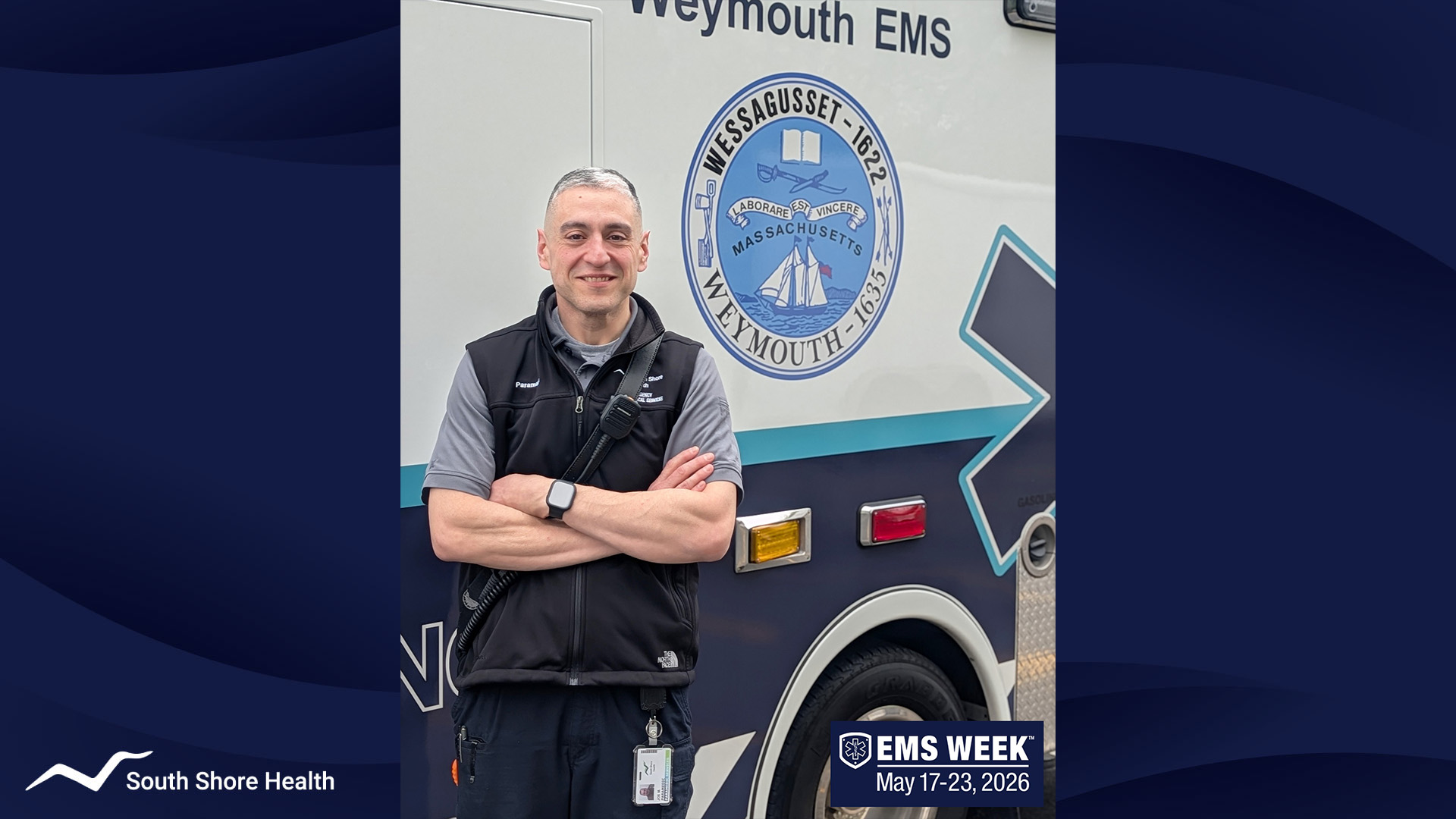 Photo of Joe, a paramedic with South Shore Health EMS, in front of a Town of Weymouth ambulance.