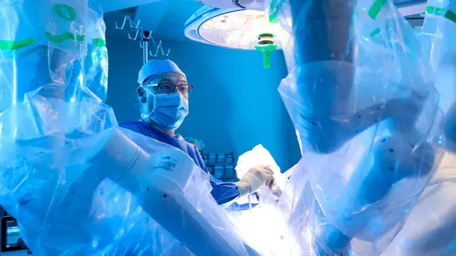 Sergio Fefer, MD performs a robotic-assisted surgery at South Shore Hospital