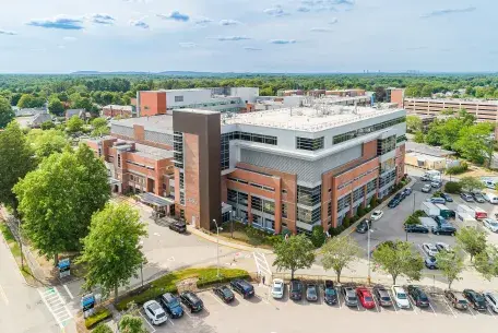 The exterior of South Shore Hospital as seen by a drone, facing the Emergency Department Entrance.