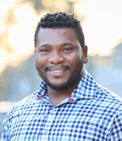 Professional headshot of Solomon Ajasin, MD of South Shore Health