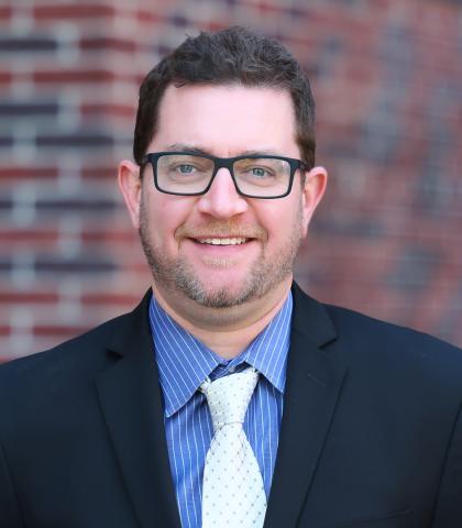 Professional headshot of Eoin Kelly, PA-C of South Shore Health
