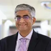 Professional headshot of Sanjay Shah, MD of South Shore Cardiology
