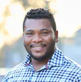 Professional headshot of Solomon Ajasin, MD of South Shore Health