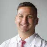 Professional headshot of William Tollefsen, MD