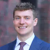 Professional headshot of Andrew Gusev, MD of South Shore Health
