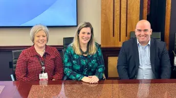 Sharon Stemm, Naomi Pollara, and Drew Harding of South Shore Health pose for a photo.