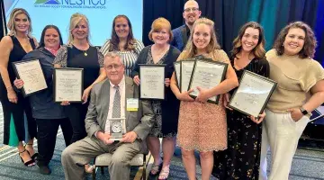 South Shore Health's Marketing & Communications Team poses for a photo at the 2024 NESHCo Awards