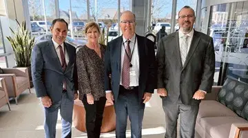 Members of the McKim Family pose with Allen Smith.
